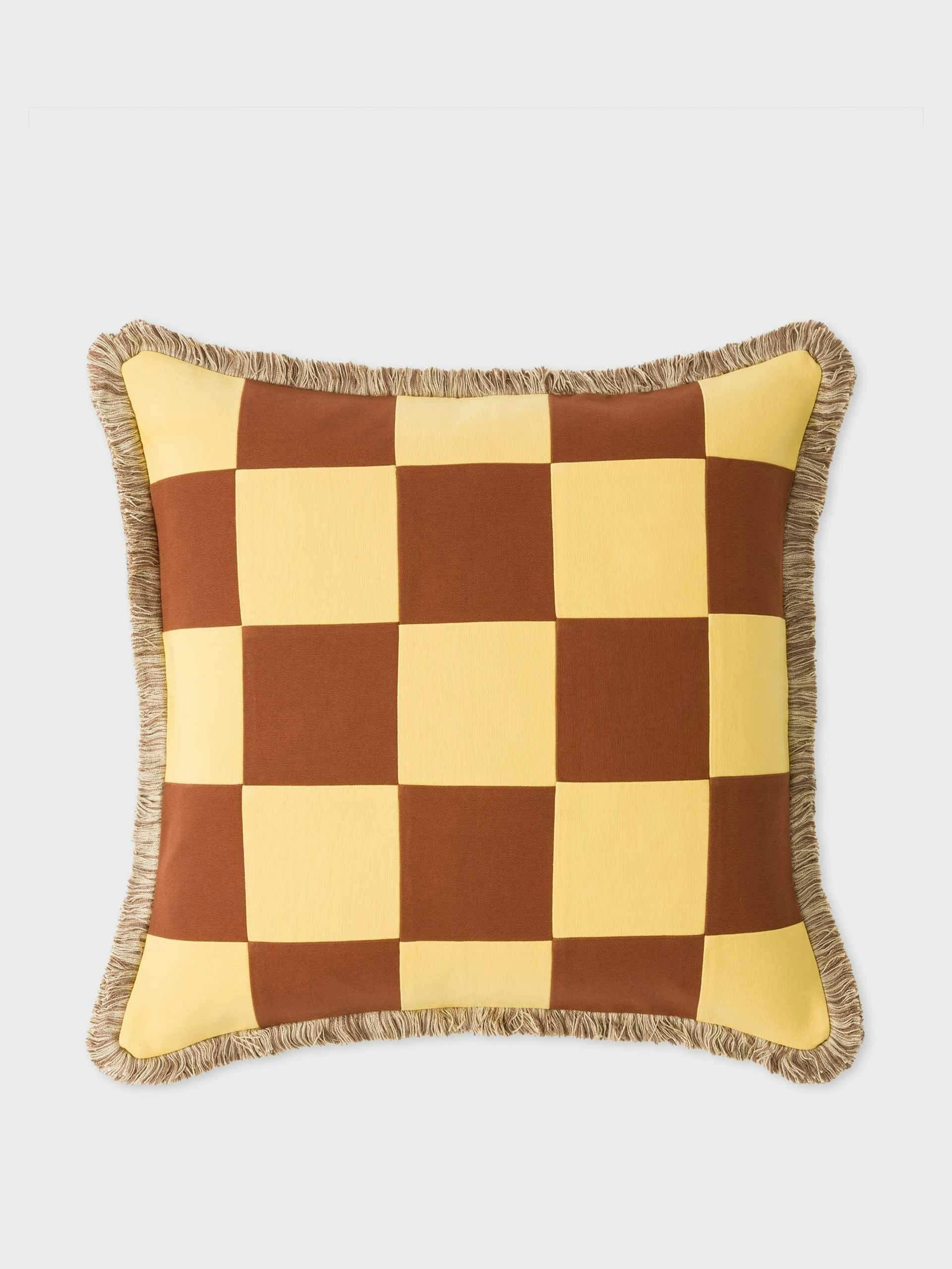 Yellow and brown patchwork fringed cushion