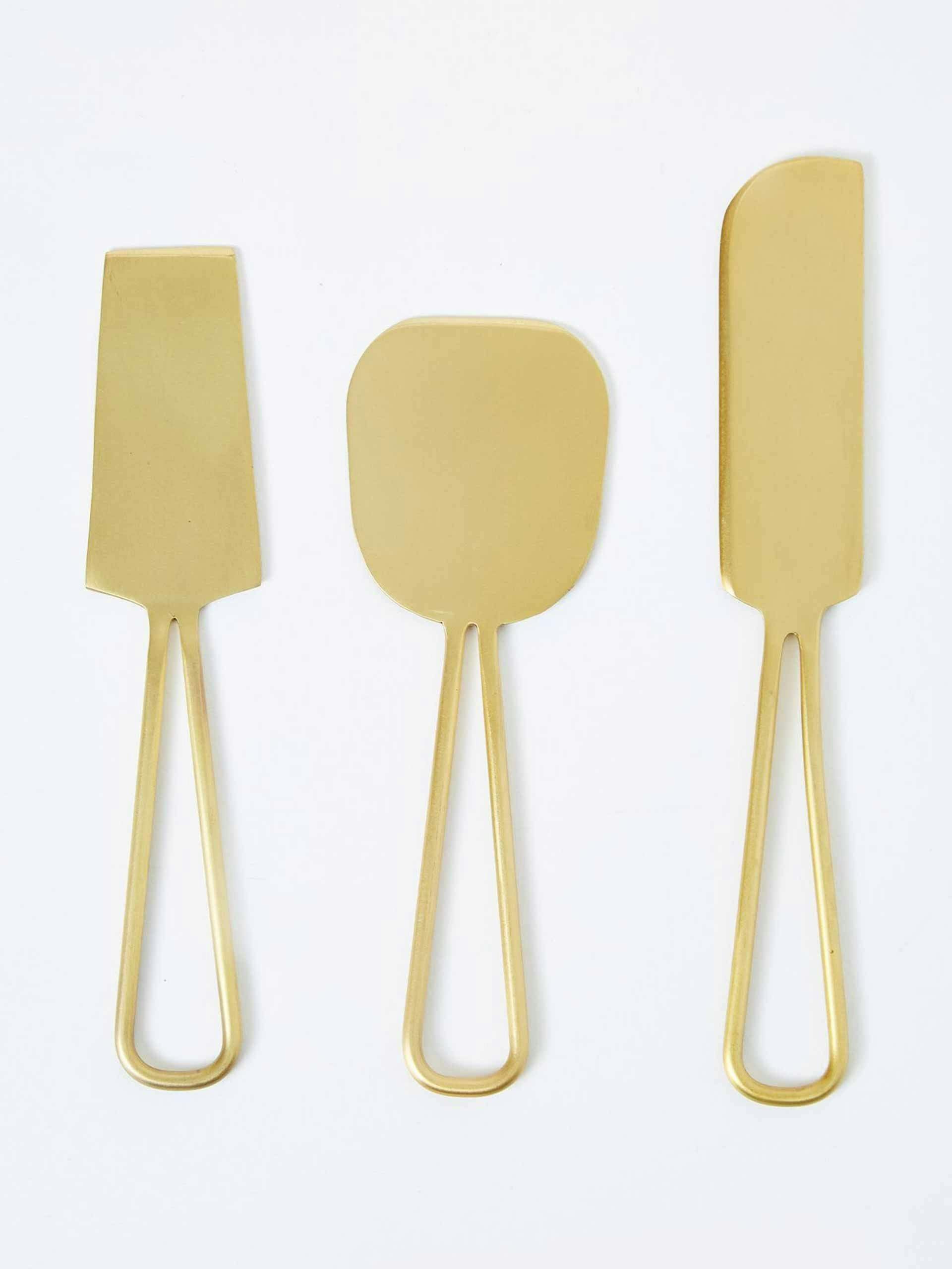 Brushed brass cheese knives