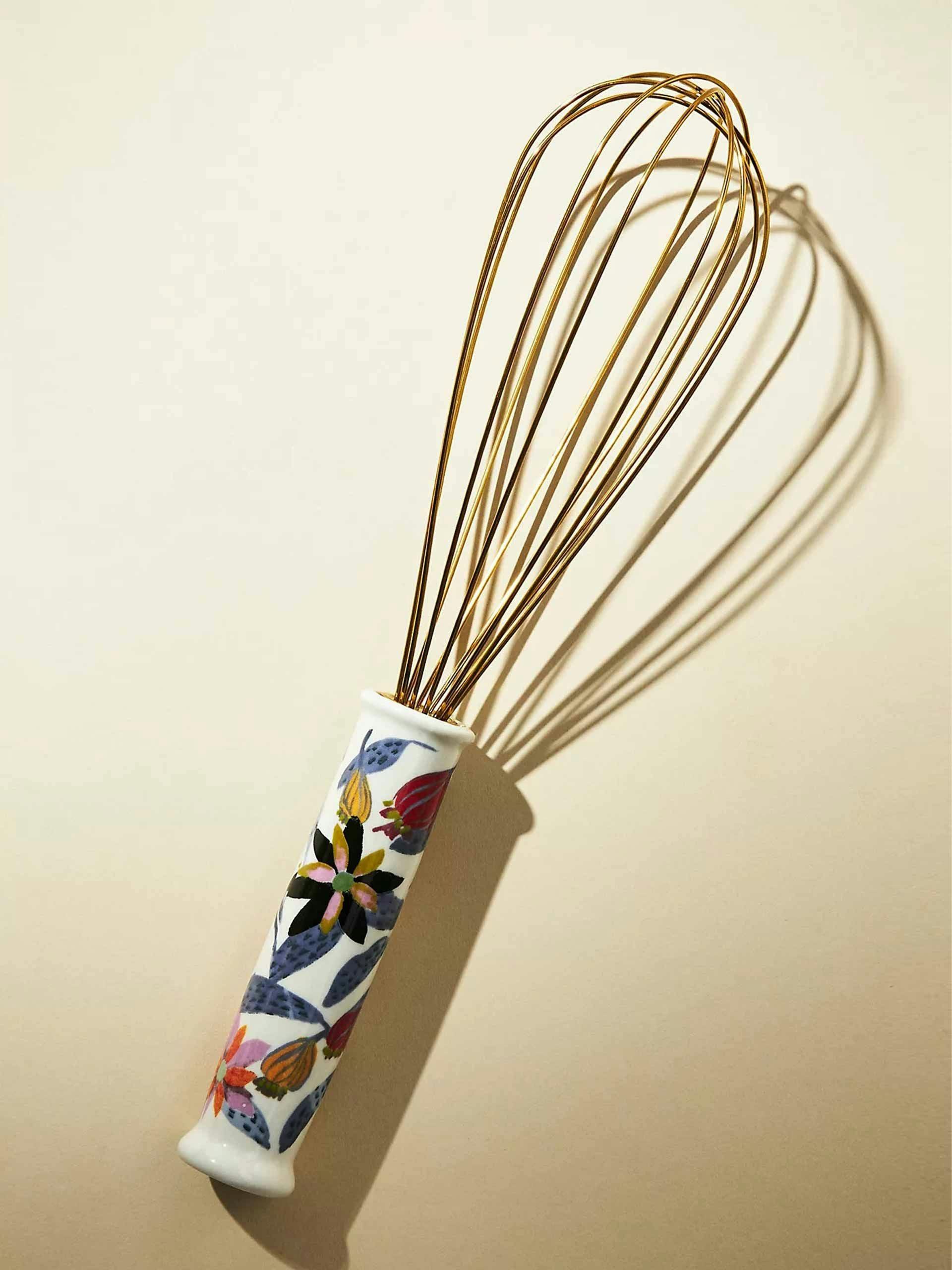 Floral handle gold whisk