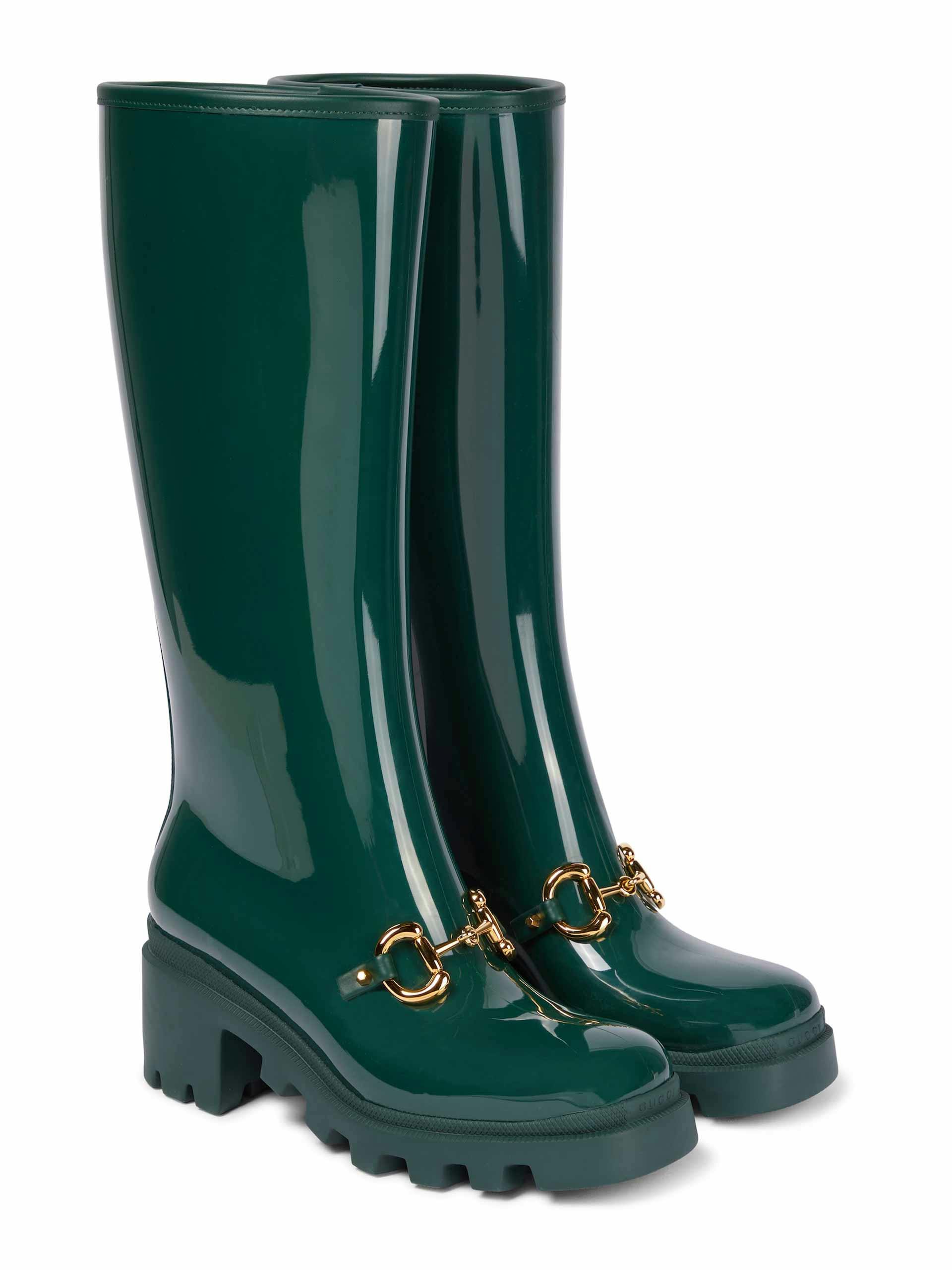 Green rubber knee high boots