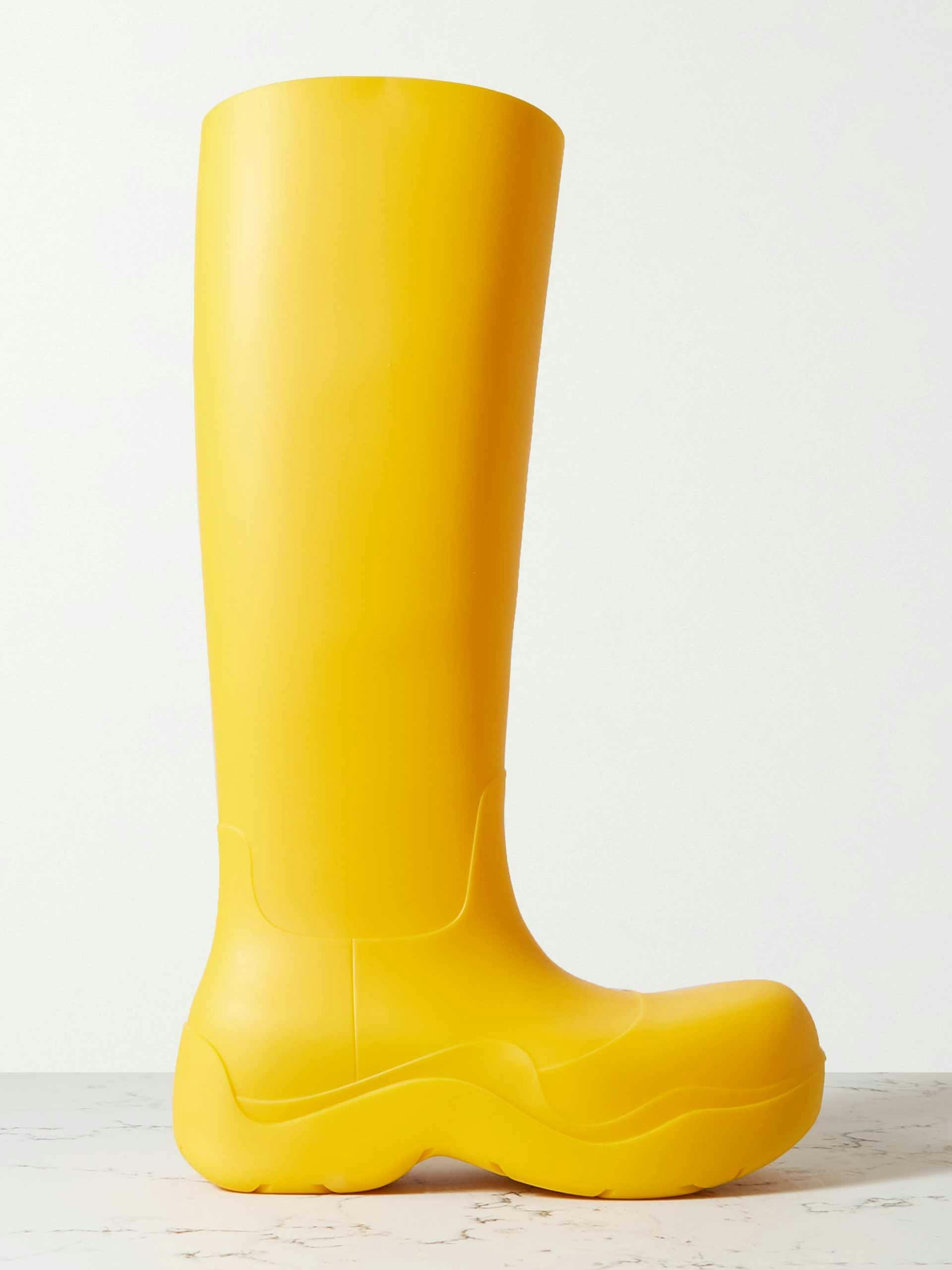 Yellow rubber knee high boots