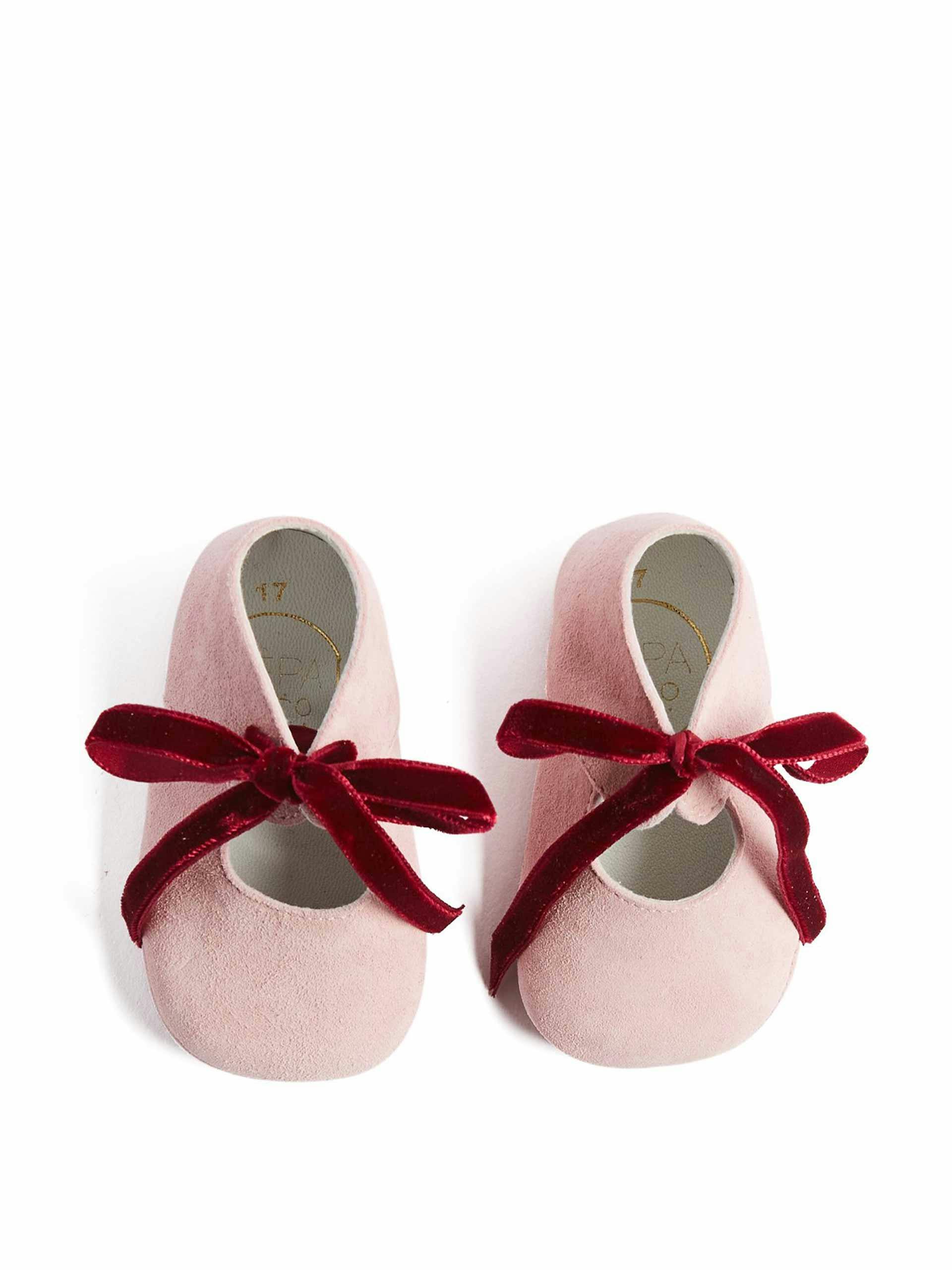 Pink suede baby shoes